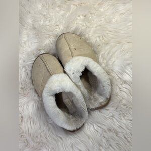 well worn beige tan house slippers shoes